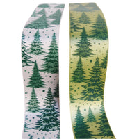 Two ribbons with green tree patterns on a wooden surface