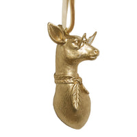 Gold deer ornament on a white background